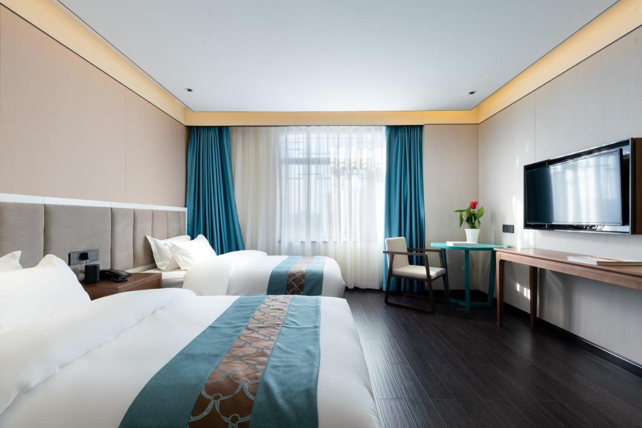 Beijing Tangfu Hotel - Located In The City Center Adjacent To The Subway Station Close To Nanluoguxiang Gulou Lama Temple Tiananmen Square Forbidden City Temple Of Heaven Providing Laundry Car Rental And Ticketing Services Exteriör bild